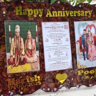 Large anniversary resin frame with wedding photos and invitation