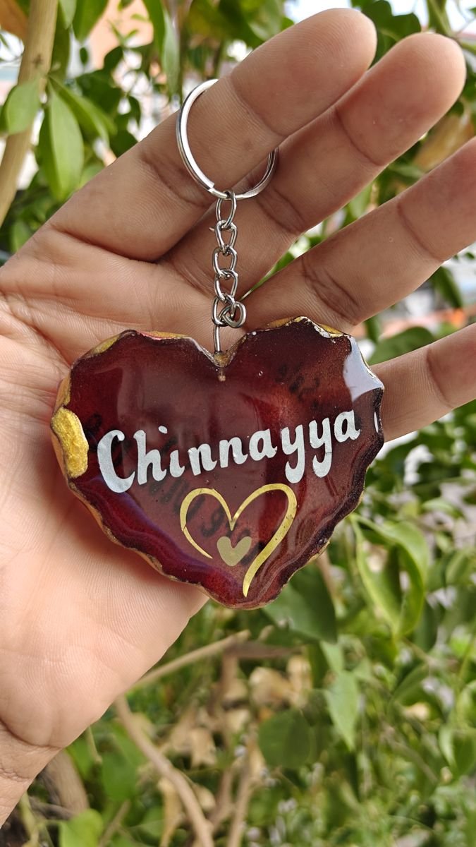 Heart resin keychain with the name Chinnayya