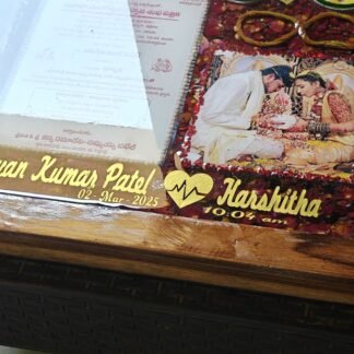 Varamala flowers and wedding photos preserved in a resin frame