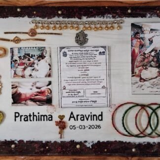 Wooden frame with wedding card, photos and bangles set in resin