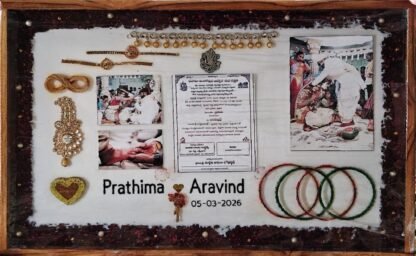 Wooden frame with wedding card, photos and bangles set in resin