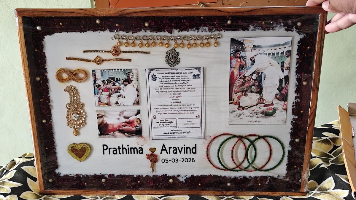 Wooden resin frame with wedding photos